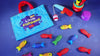The Great Catch fishing set in play — soft fish, numbered stacking cups, plush rod and the fold-up carry bag