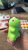 A child using the dinosaur reader independently across several card categories